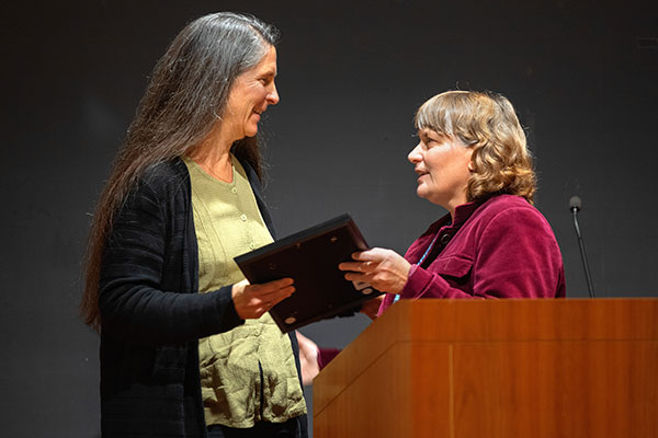 Jennifer Grant accepting award from Deborah Grantham