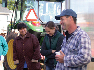 Don Dzen talking about IPM near a tractor