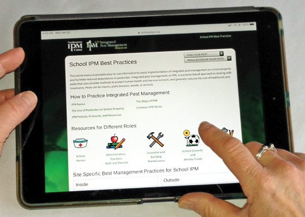 School IPM Best Practices website shown on a tablet computer