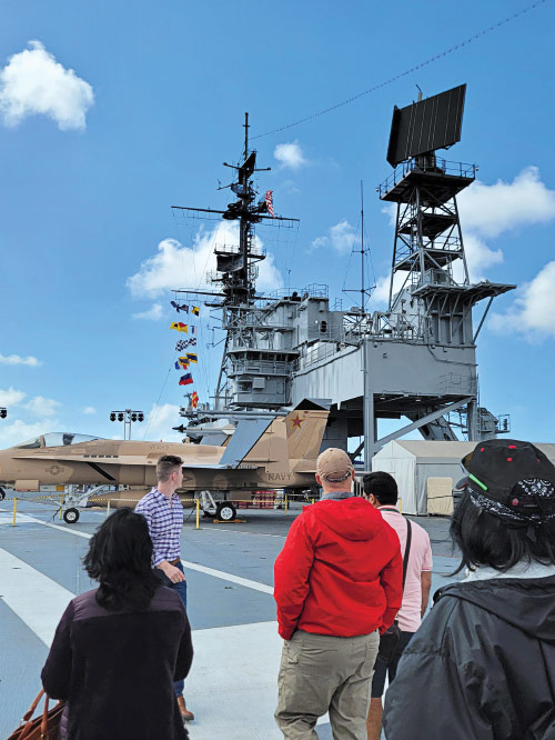 People touring the USS Midway Museum.